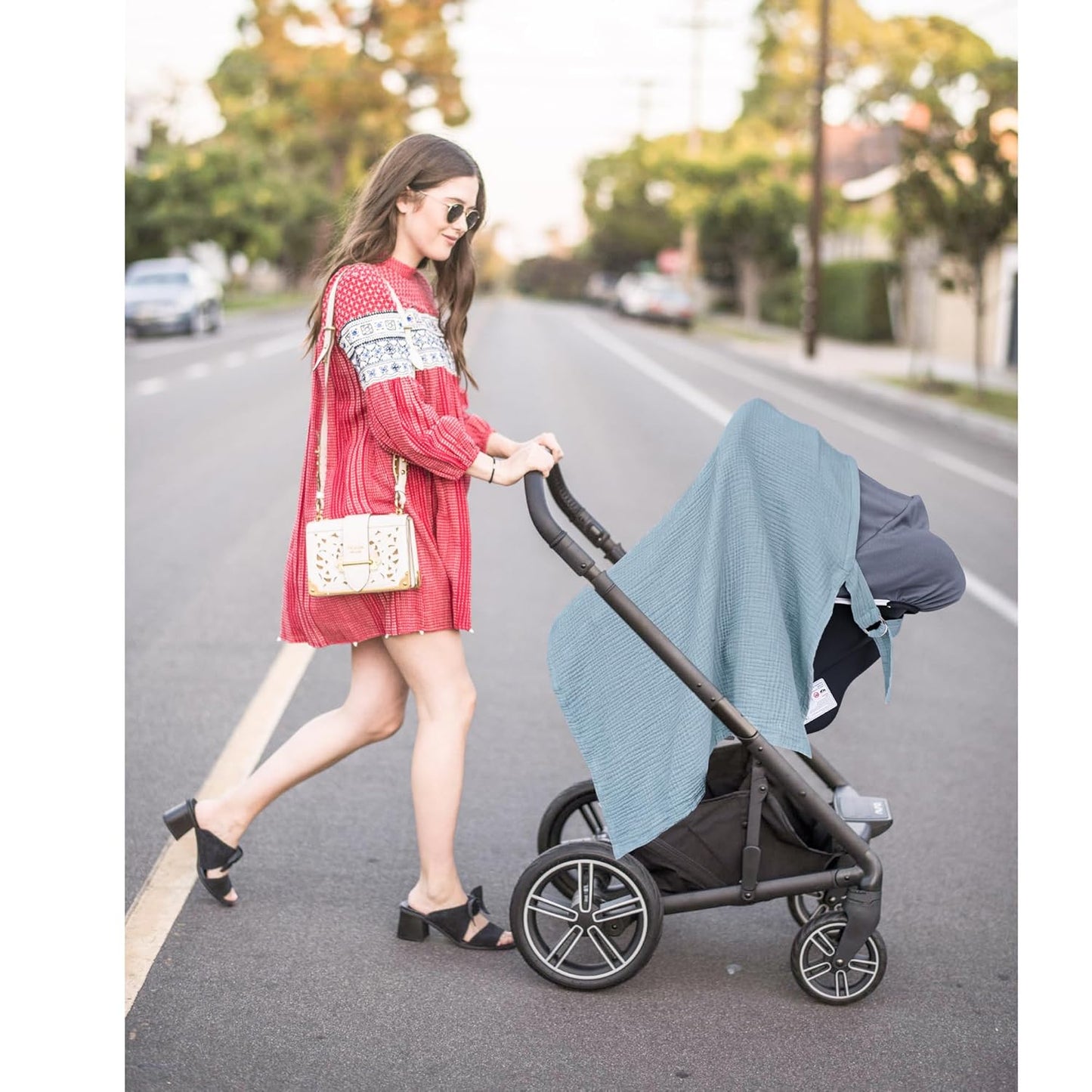 Blue X With Love muslin nursing cover for breastfeeding, breathable cotton with rigid hoop, versatile carseat canopy for mothers.