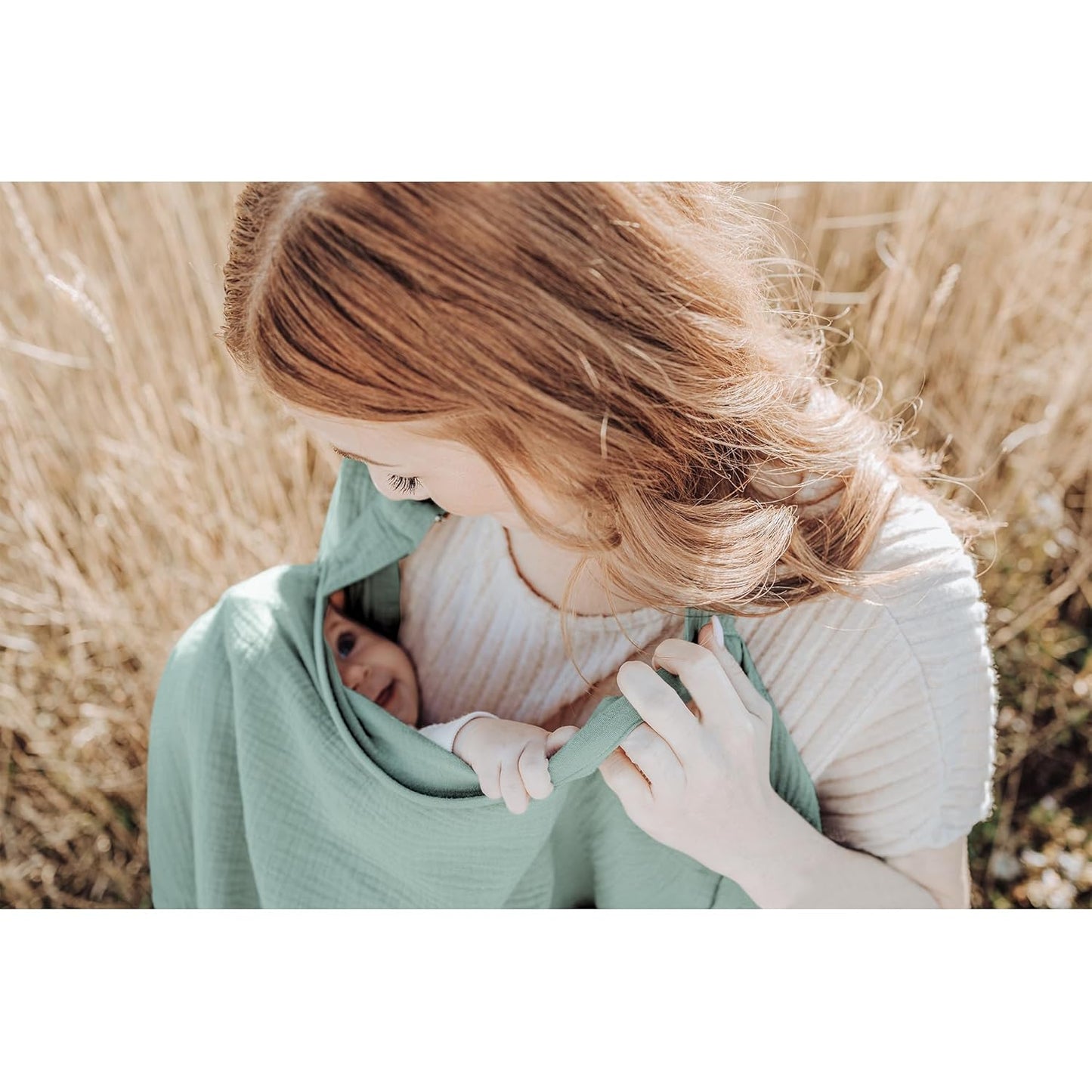 Green X With Love muslin nursing cover with rigid hoop, breathable 100% cotton, designed for breastfeeding and carseat shading.