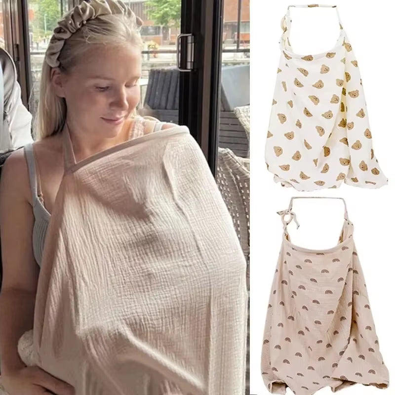 Breathable cotton muslin baby nursing cover by X With Love, provides privacy for breastfeeding and stroller comfort.