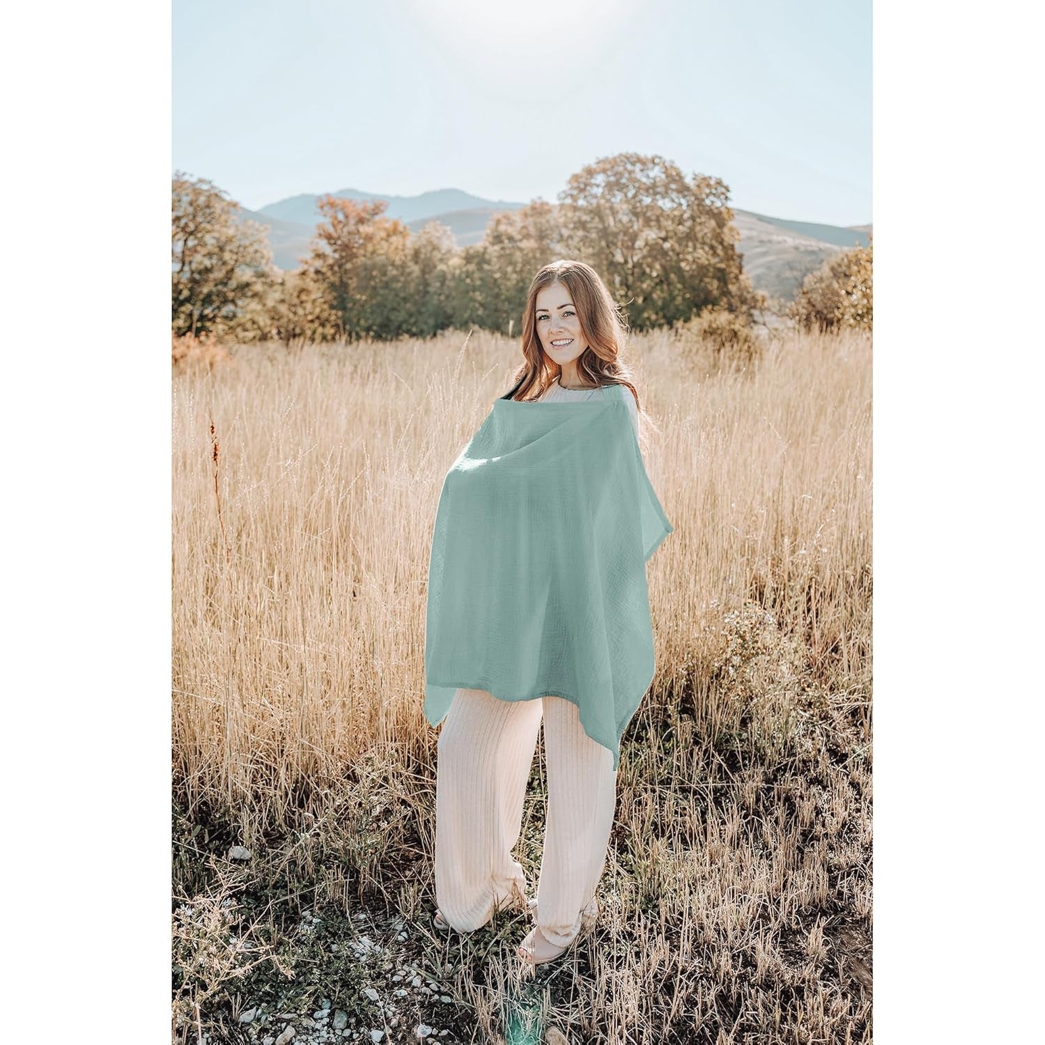 Green X With Love muslin nursing cover with rigid hoop for breastfeeding, breathable 100% cotton, versatile carseat canopy.