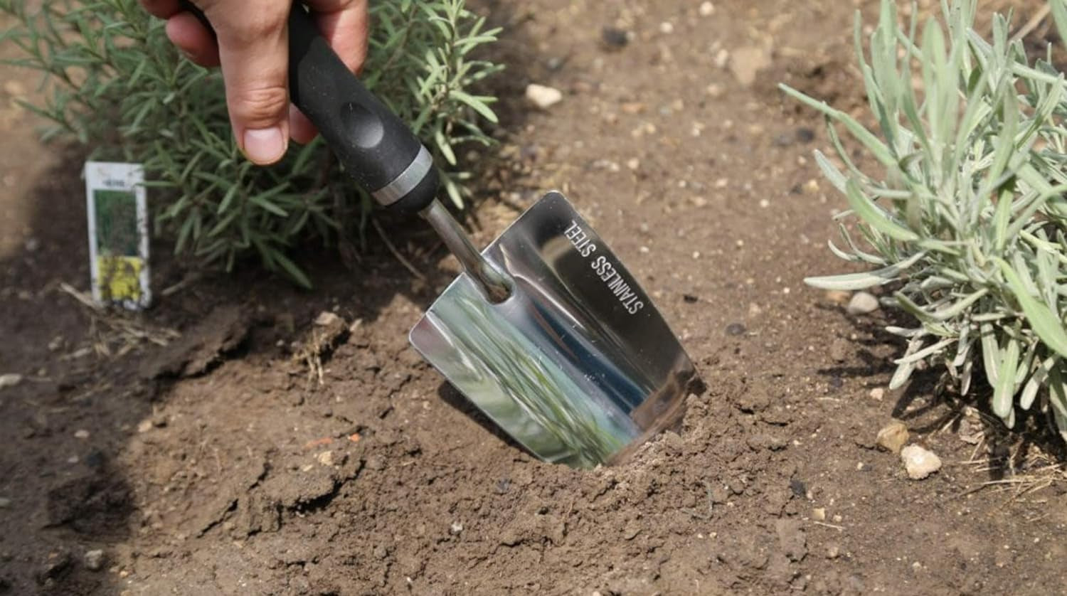 Heavy duty stainless steel garden trowel by My Store with a comfort grip, ideal for digging rocky or heavy soils.