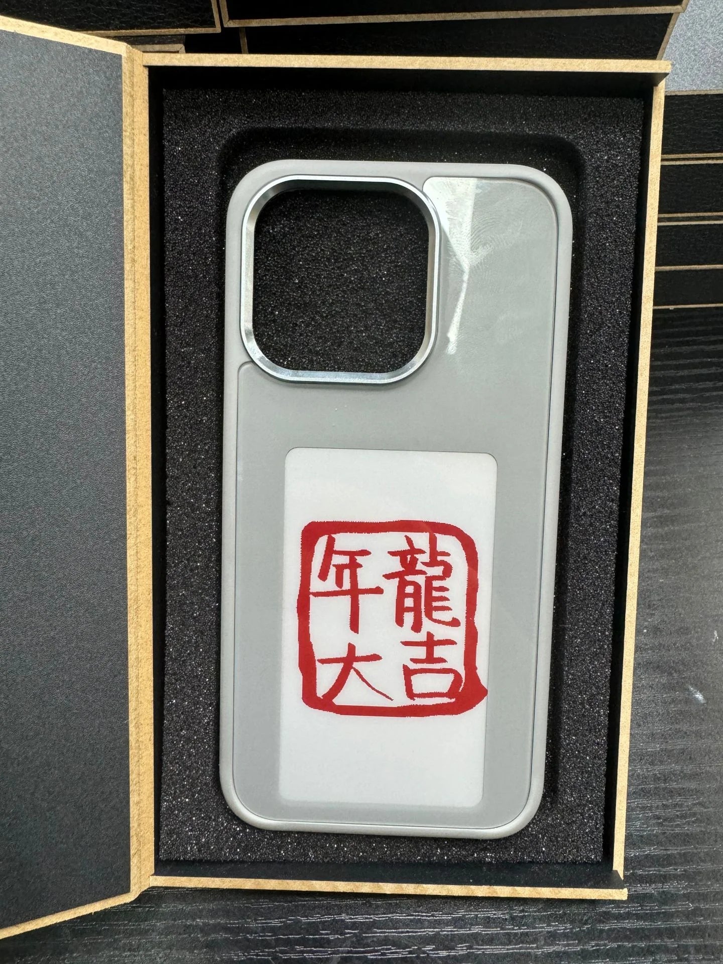 X With Love e-ink screen phone case with personalized projection display, sleek designer luxury phone cover, battery-free.