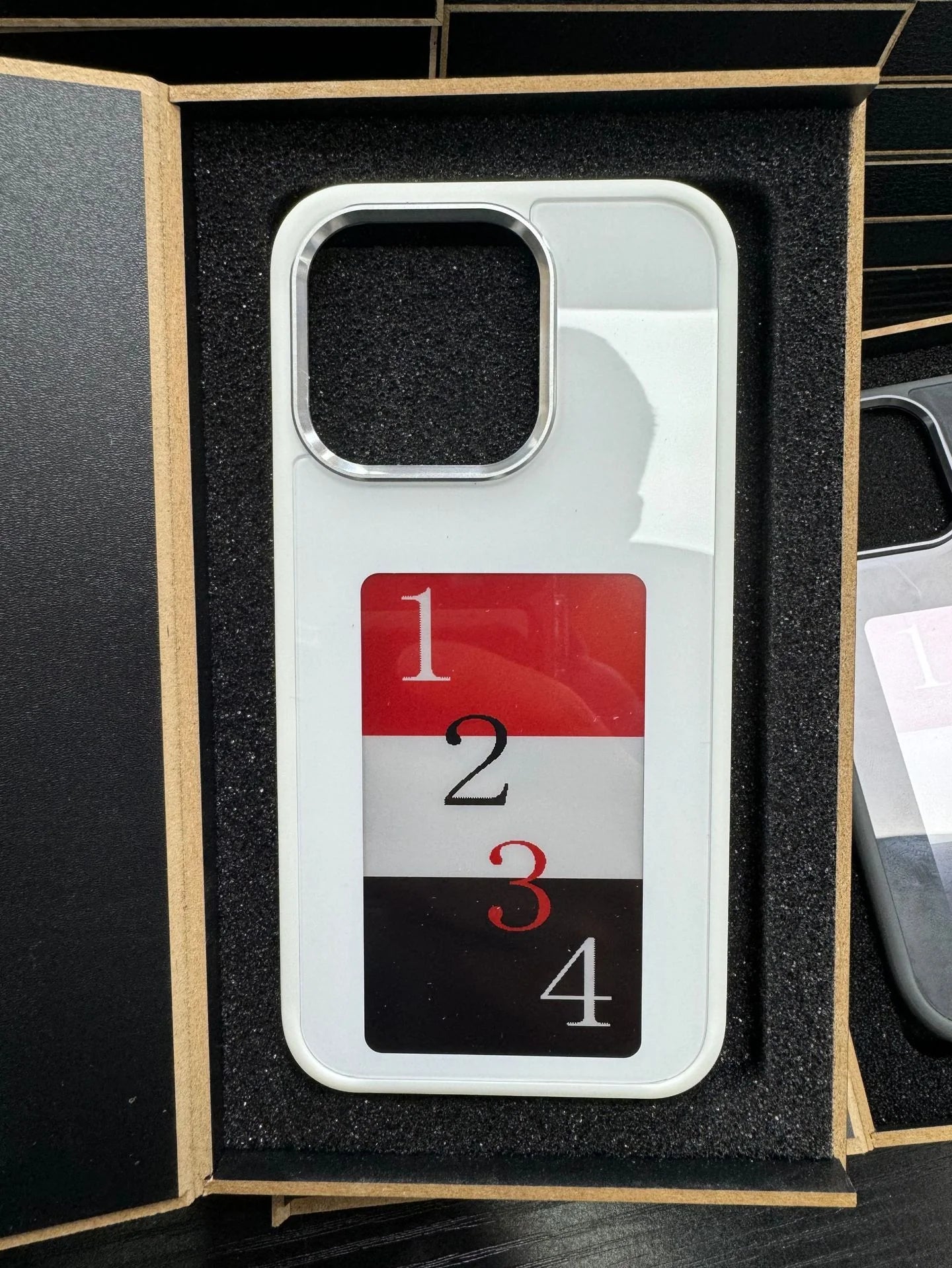X With Love E-Ink Screen Phone Case with unlimited screen projection, personalized design, slim battery-free luxury phone cover.
