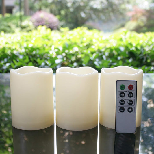 Set of three waterproof battery-operated flameless LED pillar candles with remote, flickering light, plastic resin for Christmas and wedding decor