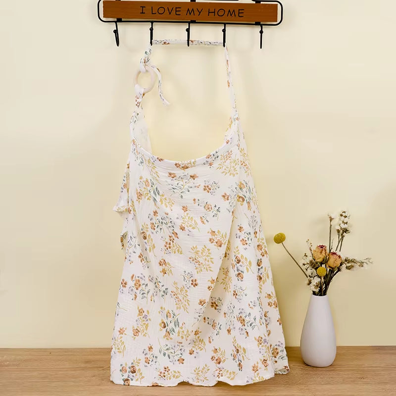 Breathable cotton baby nursing cover by X With Love, soft muslin breastfeeding blanket for privacy and comfort during feeding.