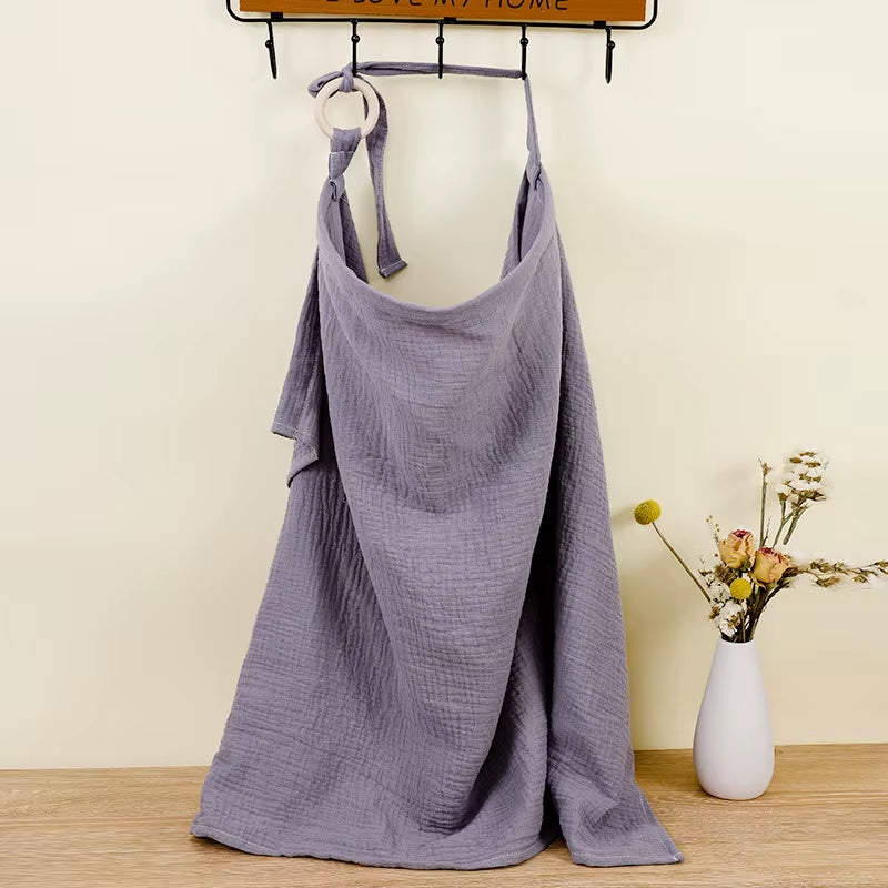 Breathable X With Love baby nursing cover made of cotton muslin, providing privacy and comfort for breastfeeding and stroller use