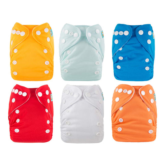 Set of six X With Love newborn cloth pocket diapers with matching inserts, designed for babies under 12 pounds, displayed with some inserts.