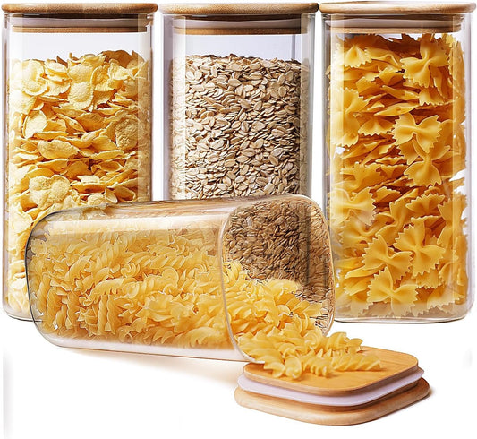 Set of four square glass jars with bamboo lids, airtight canisters for kitchen storage of pasta, cereal, coffee, flour, and sugar.
