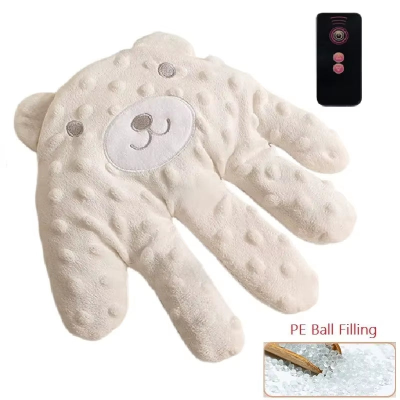 Soft baby sleep aid pillow with calming palm-shaped design and remote control, ideal for soothing infants and toddlers.