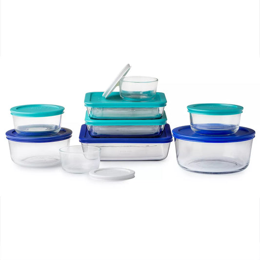 Set of six glass storage containers from the Pyrex 18-piece glass storage set by X With Love, featuring clear glass and airtight lids.