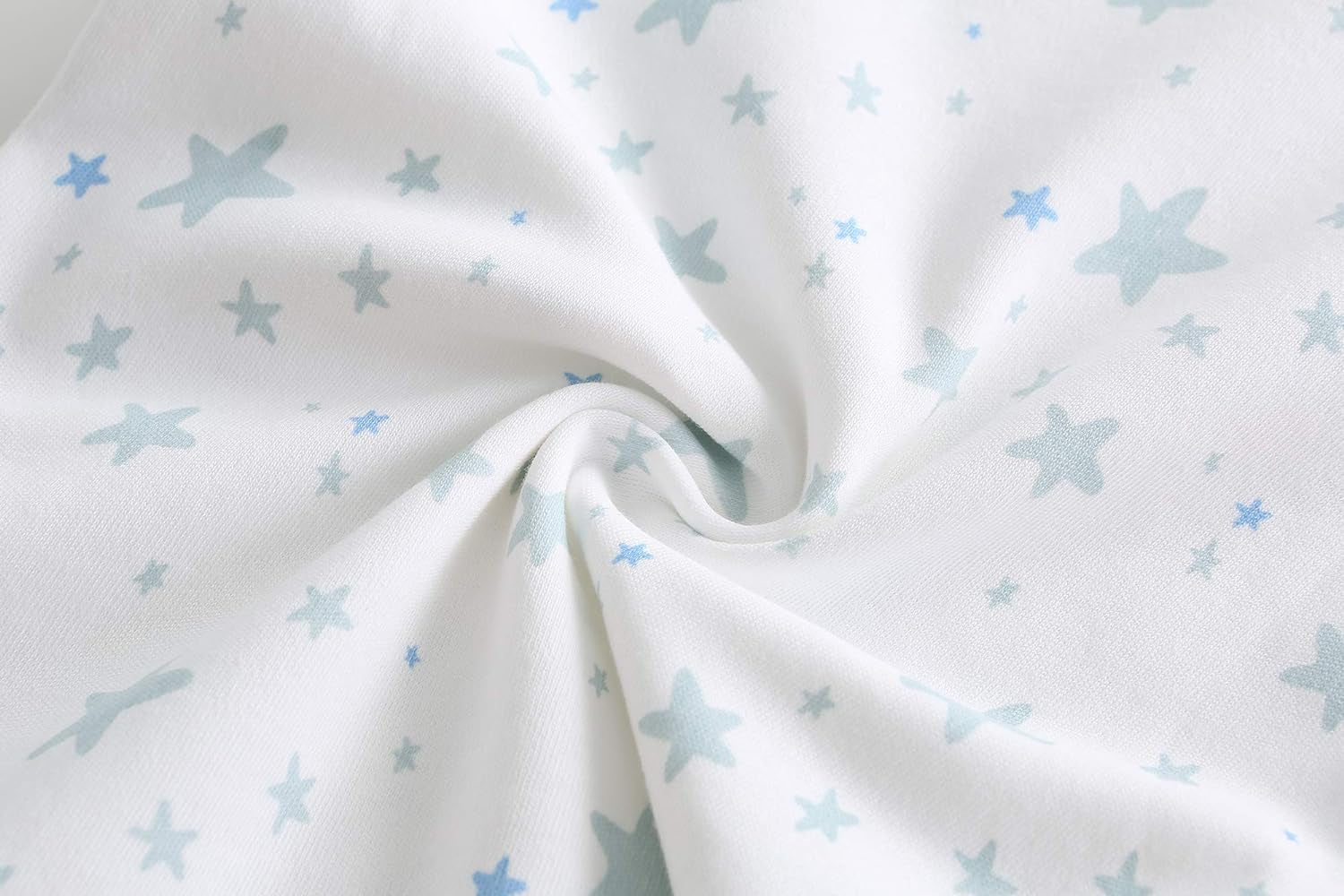 Unisex baby layette essentials gift set with 19 pieces of clothing for newborns, including onesies, hats, and socks.