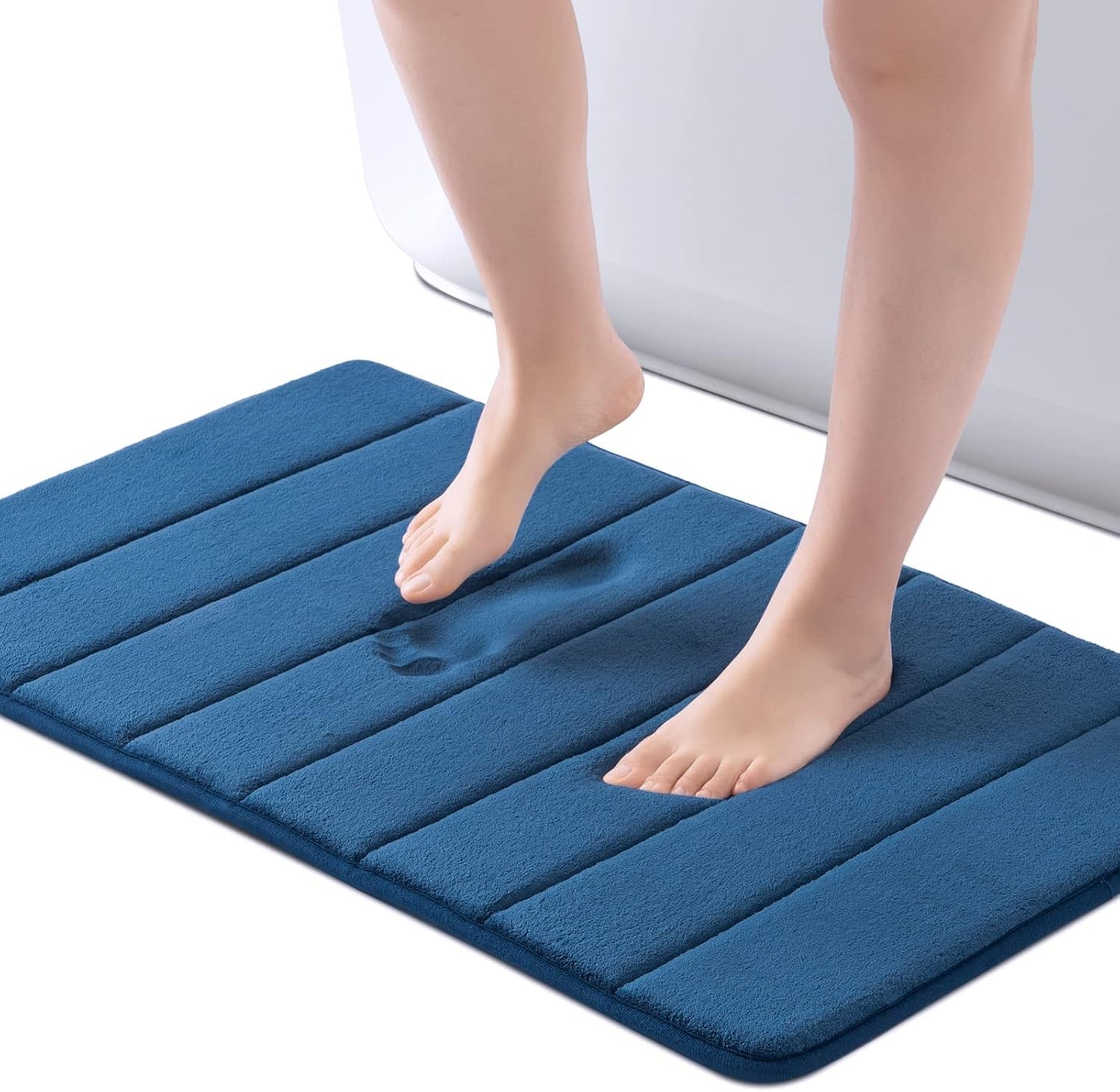 Navy memory foam bath mat with PVC backing, water absorbent, thick non-slip shower rug, ultra-soft floor and tub mat.