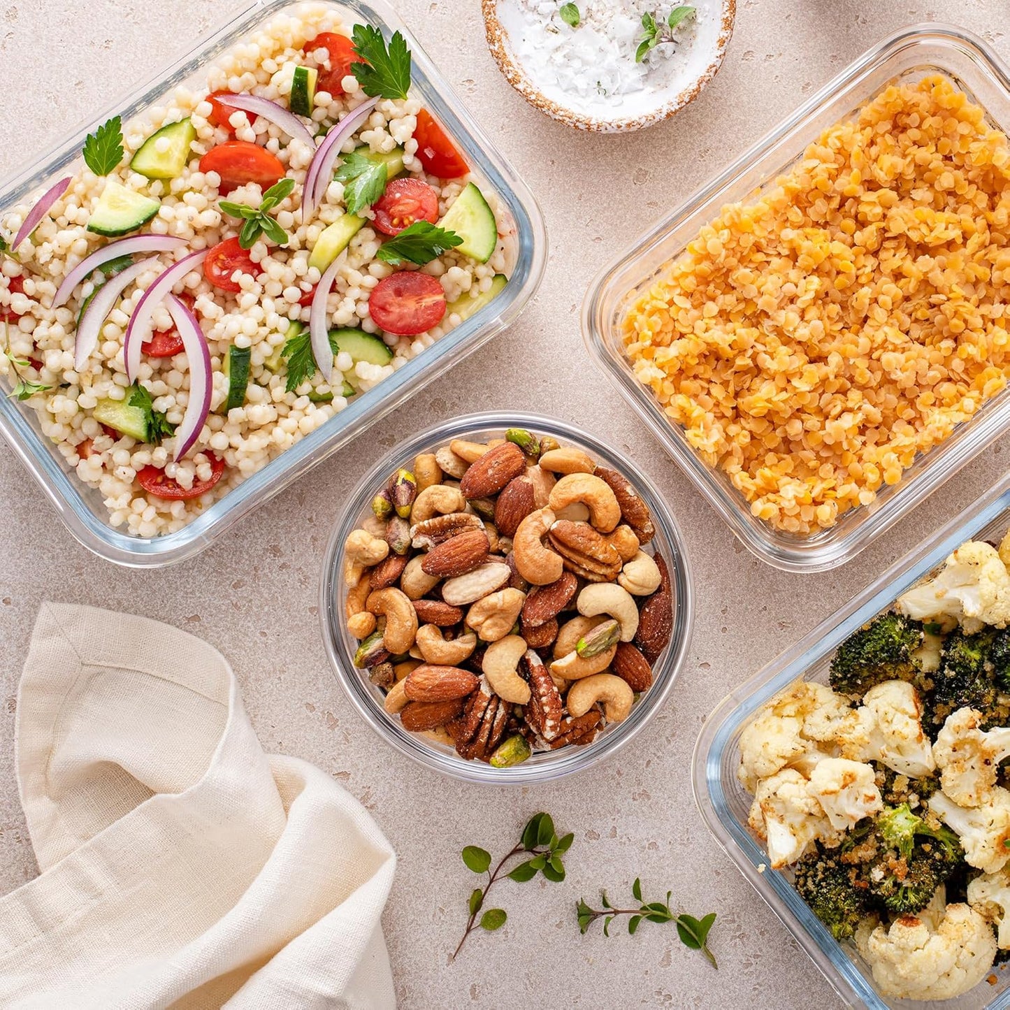 Set of 24 glass storage containers with lids, including 12 containers and 12 leak-proof lids, ideal for meal prep and food storage.