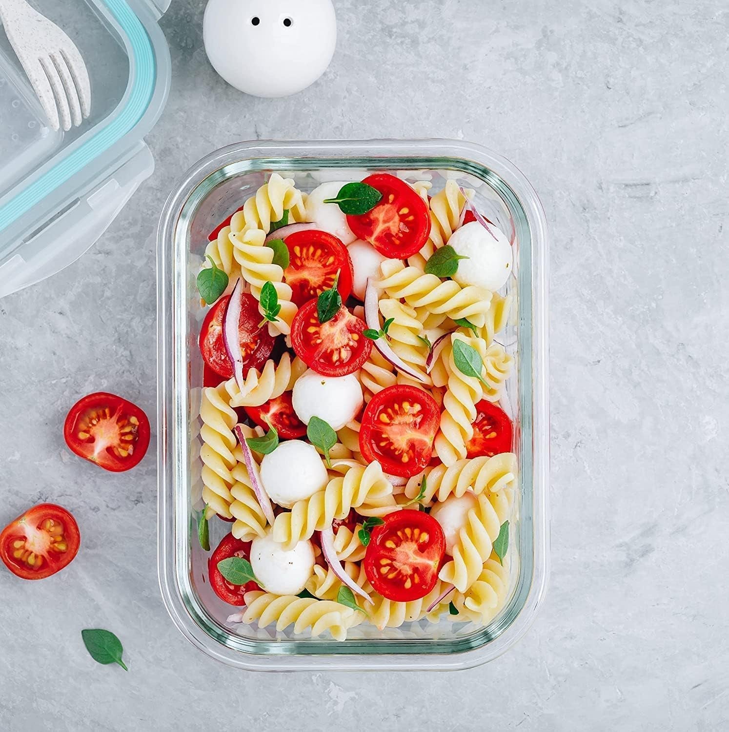 Set of 10 borosilicate glass meal prep containers with leak-proof snap-lock lids, stackable, microwave, freezer, and oven safe.