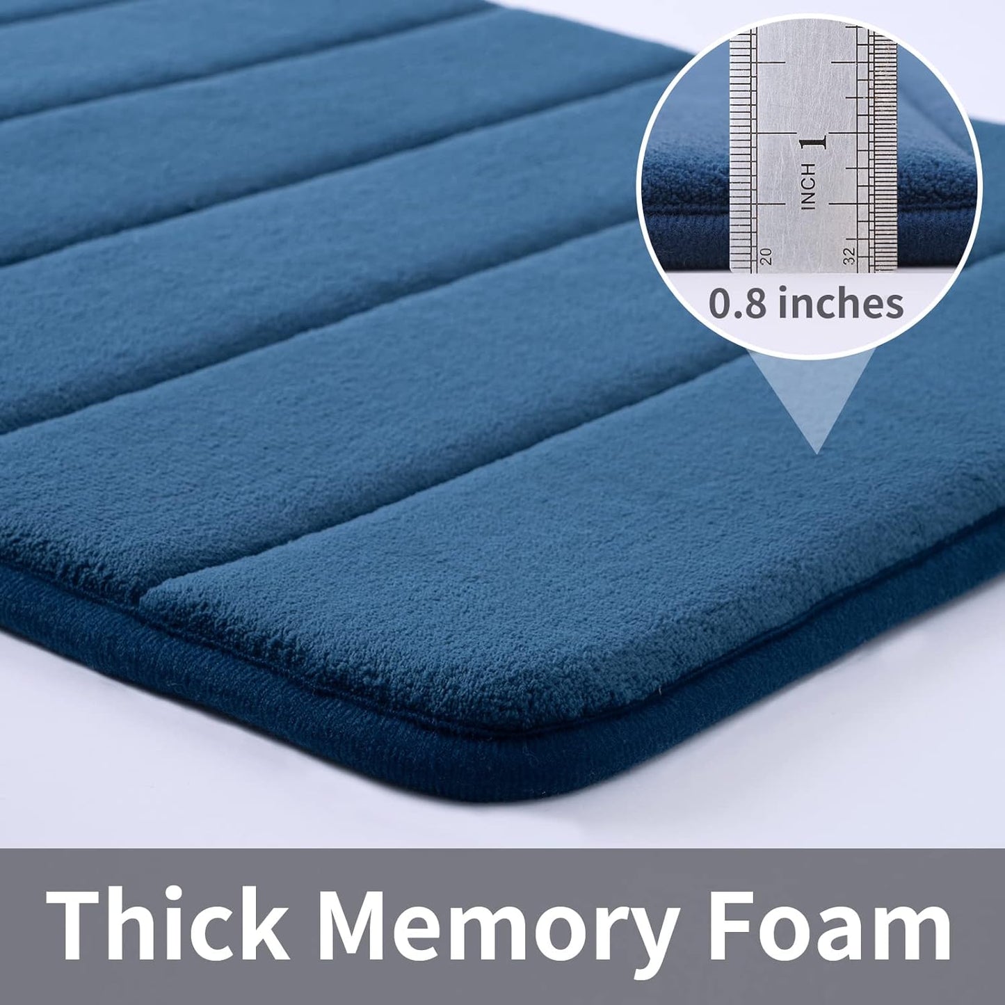 Navy memory foam bath mat measuring 20x32 inches, water absorbent, non-slip with PVC backing, ultra-soft for bathroom floor or tub.