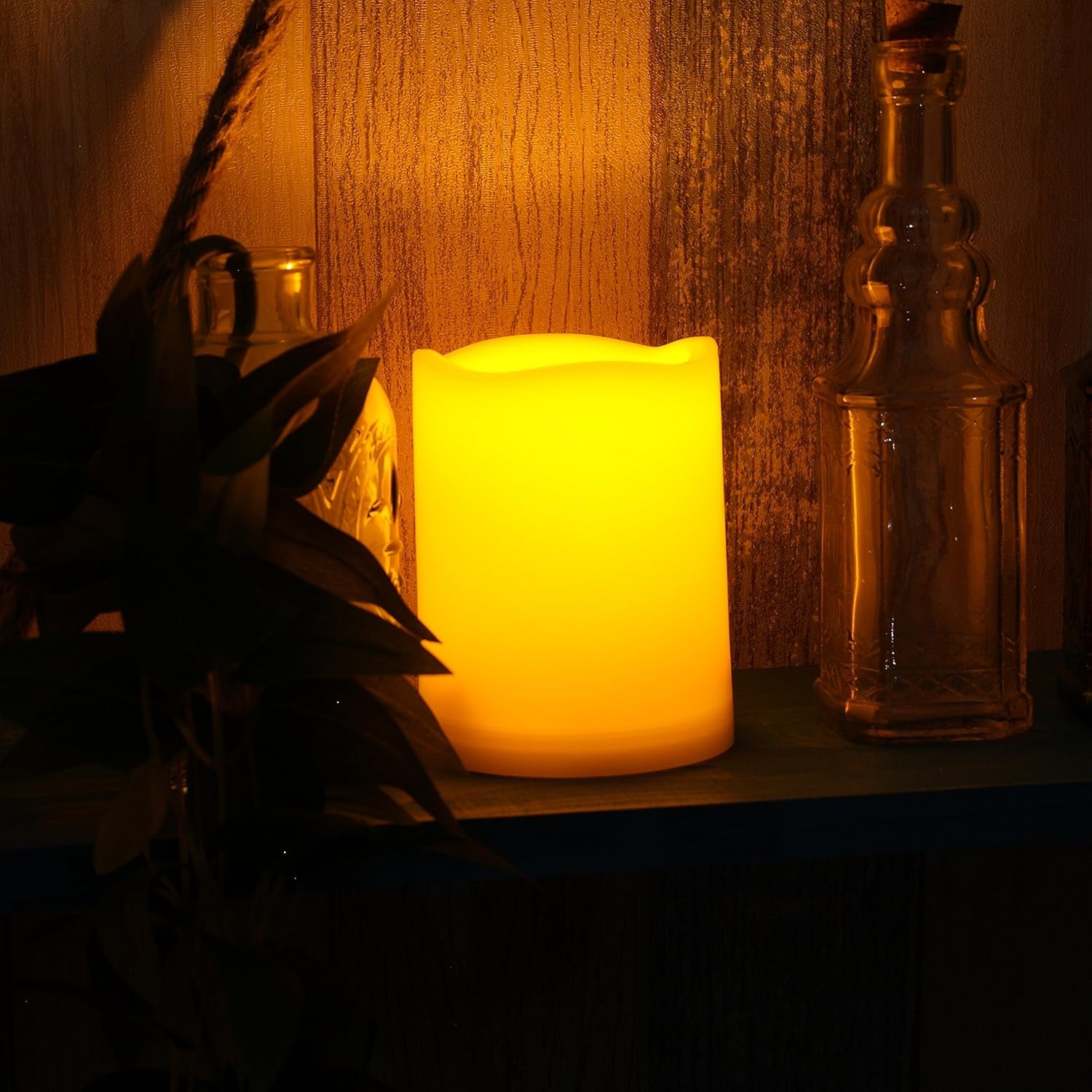 Three waterproof battery-operated flameless LED pillar candles with remote control, flickering lights, for outdoor Xmas, wedding, and party decor