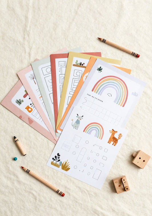 Colorful rainbow busy book printable for toddlers, featuring screen-free activities and preschool worksheets in a Montessori learning kit.