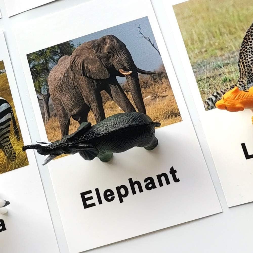 Set of miniature forest animal toys with matching cards from X With Love's Montessori Animal Match learning set for preschool education.