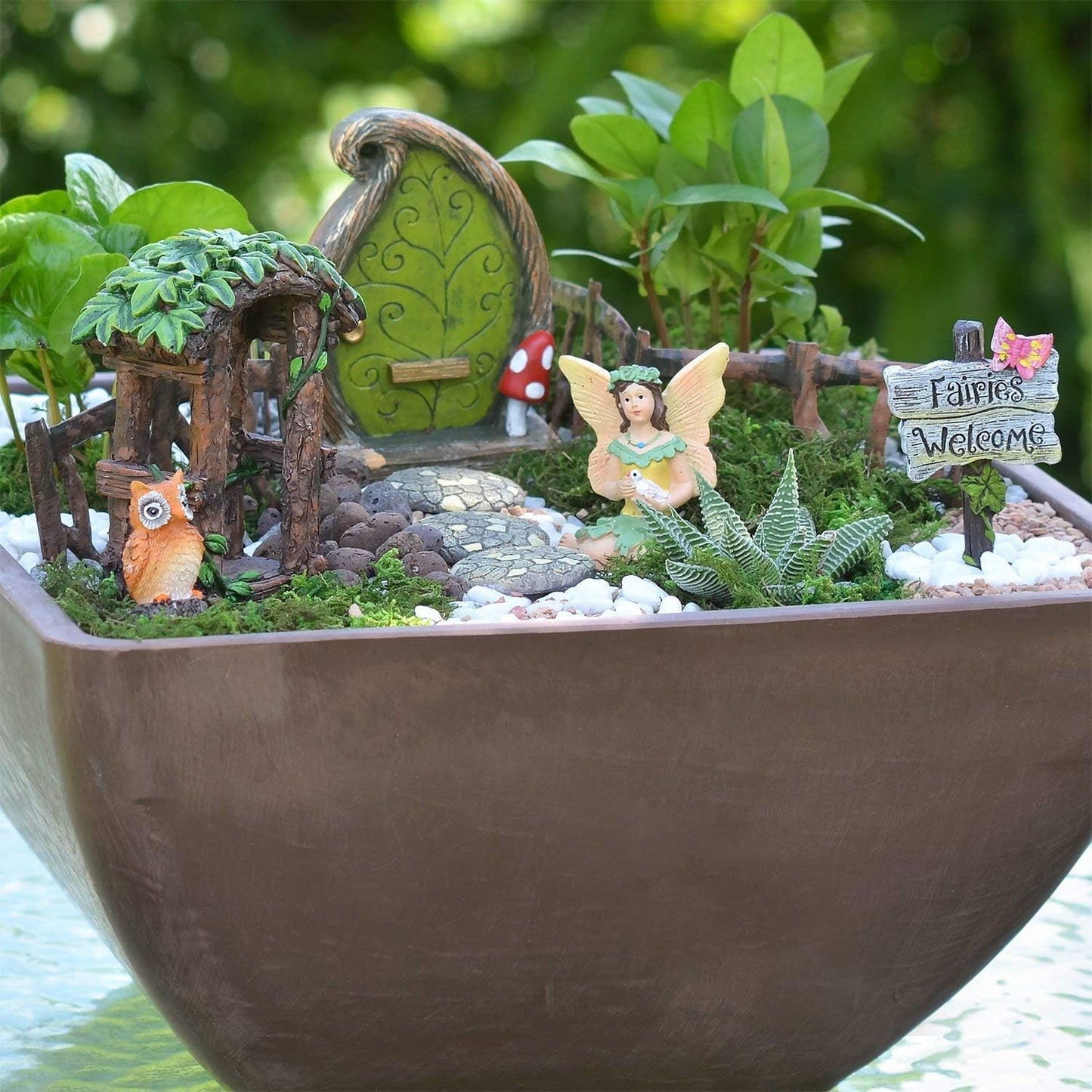 Charming Forest Fairy Garden Kit by X With Love featuring miniature fairy figures, lush greenery, and woodland accessories.