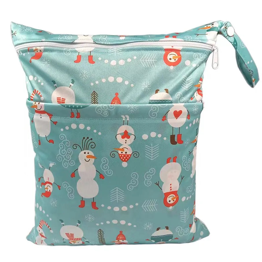 X With Love waterproof wet-dry bag with two zippers, reusable diaper storage bag for baby nappies, measuring 36cm by 29cm.