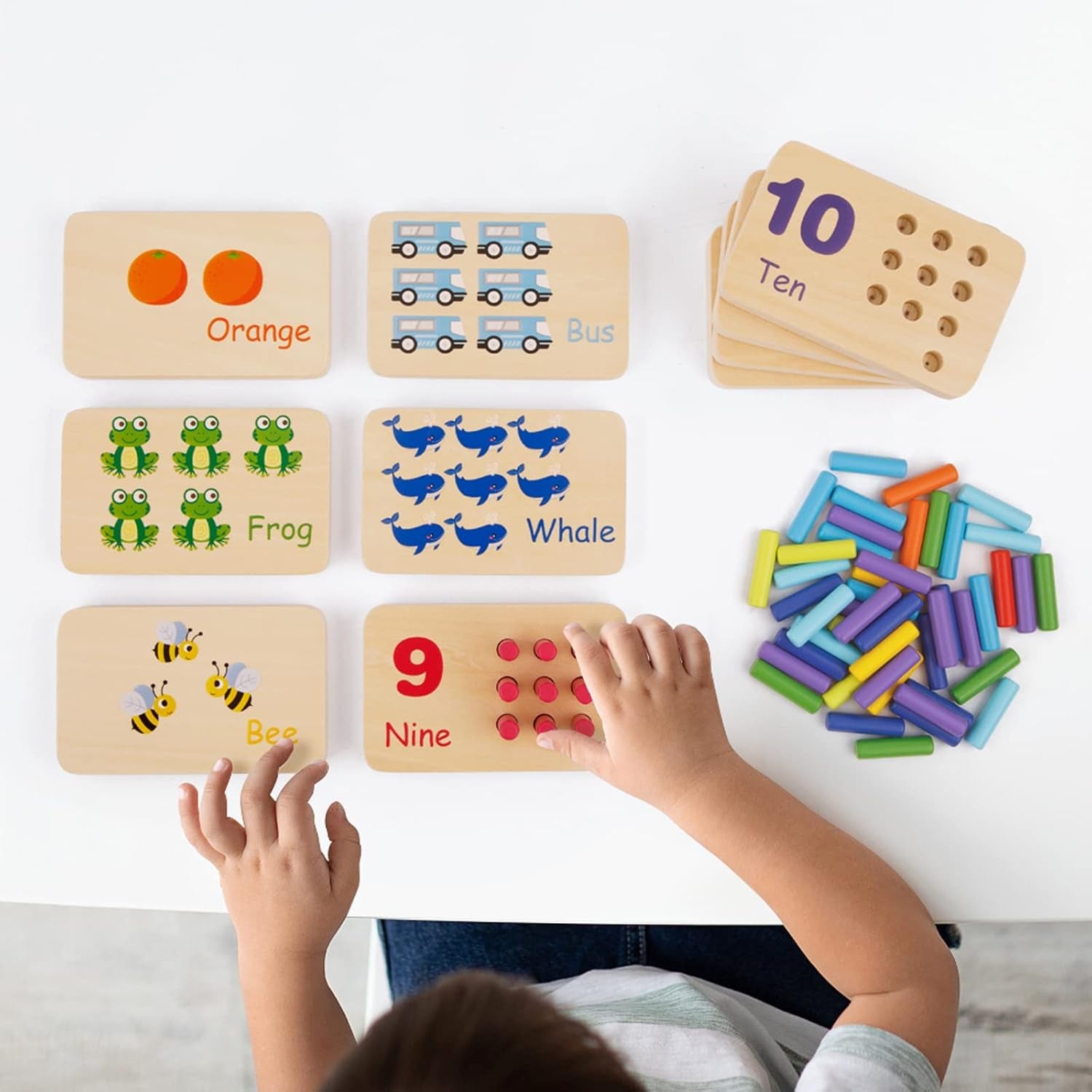 Wooden peg board toddler toy with 55 pegs for counting and math activities, used for Montessori learning and kindergarten education.