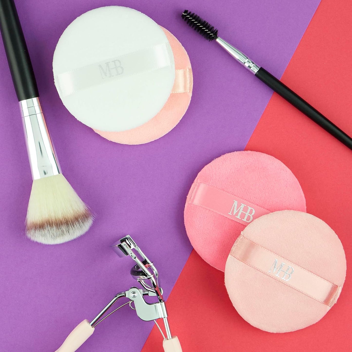 Eight soft round beauty buff blenders from X With Love, perfect for flawless makeup blending and setting.