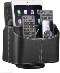 Leather remote control holder with 360-degree spinning design, holds TV remotes, phones, pens, and small items on a bedside or desk.