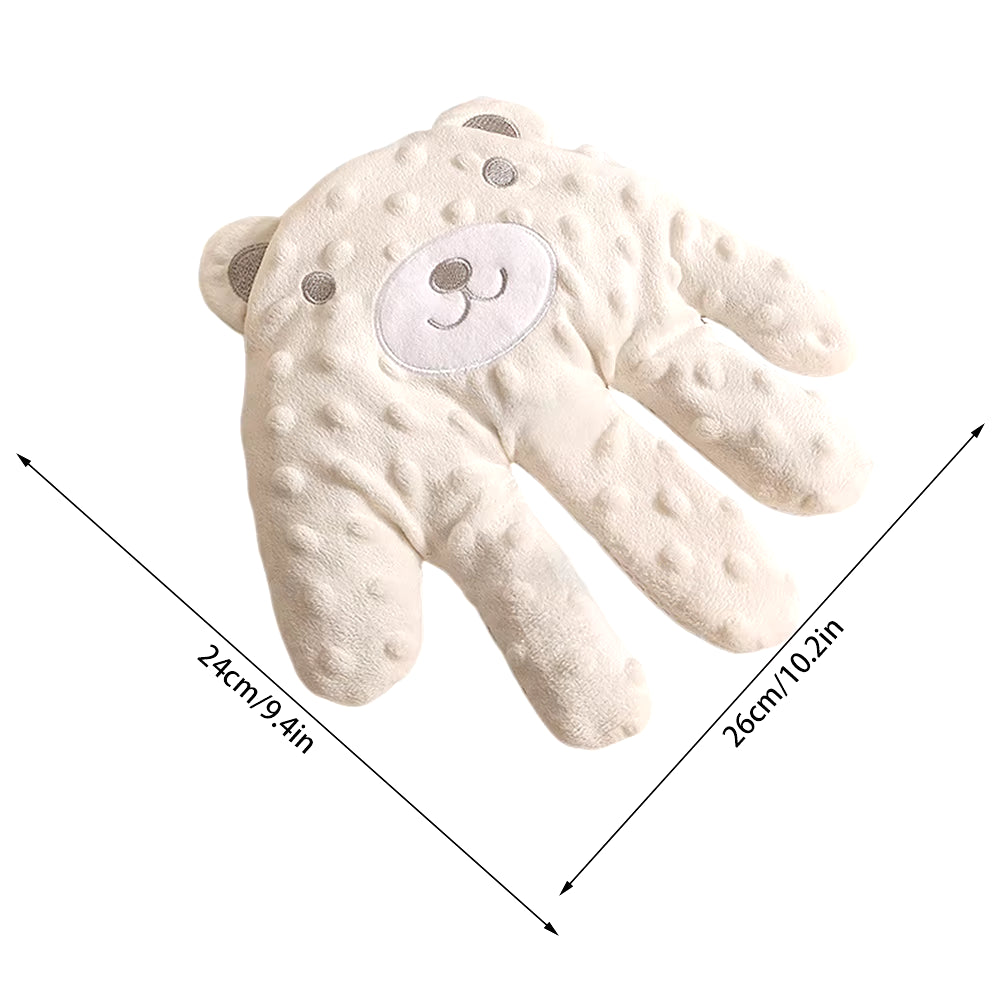 Soothing baby sleep aid pillow with palm-shaped calming hands for infants, designed to help toddlers sleep peacefully.