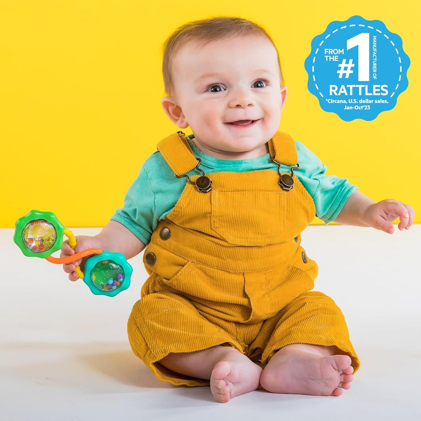 Green Rattle & Shake Barbell toy for babies aged 3 months and up, made by My Store, with colorful rattling and shaking features.