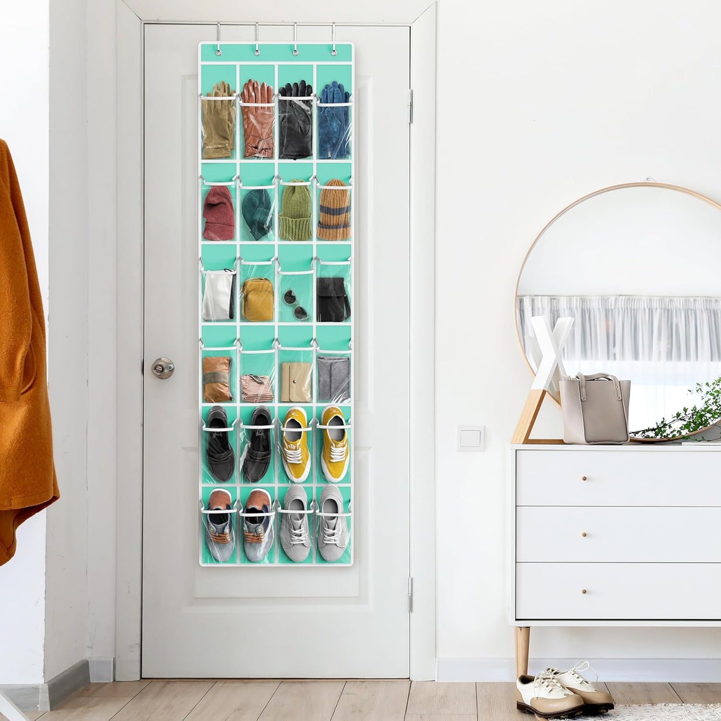 Crystal clear over-the-door shoe organizer with 24 turquoise pockets, 64 inches long for easy storage and organization.